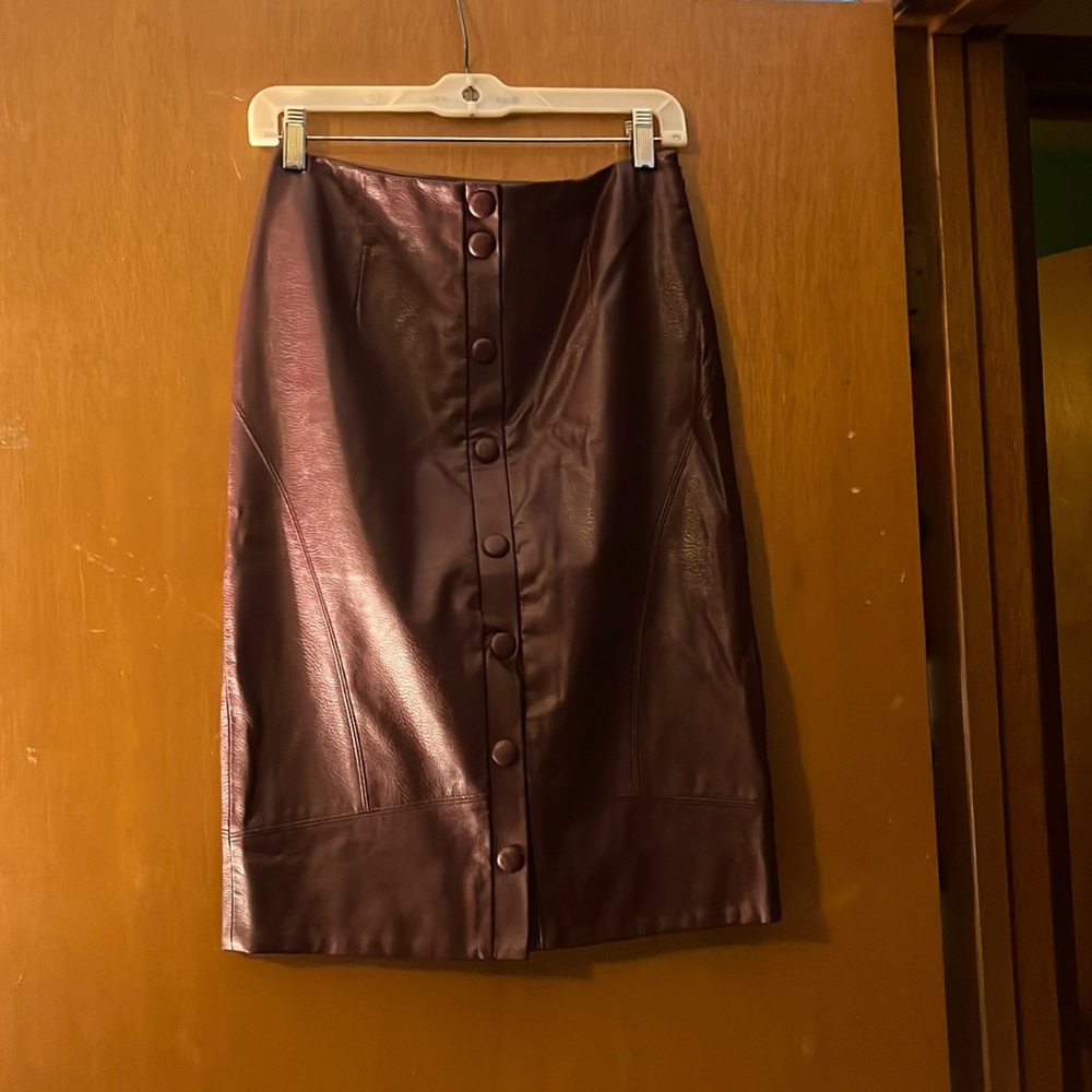 Burgundy leather texture pencil skirt with side zip and snaps